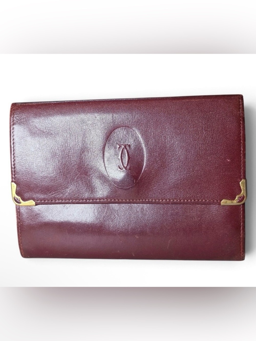 VINTAGE Cartier Kiss lock
Compact Wallet Burgundy
